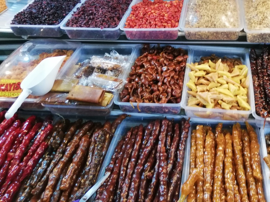 Turkish sweet sucuk. Walnut and molasses sweet at the Turkish market